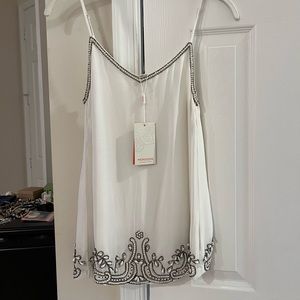 Brand new classy tank top with decorative pearls